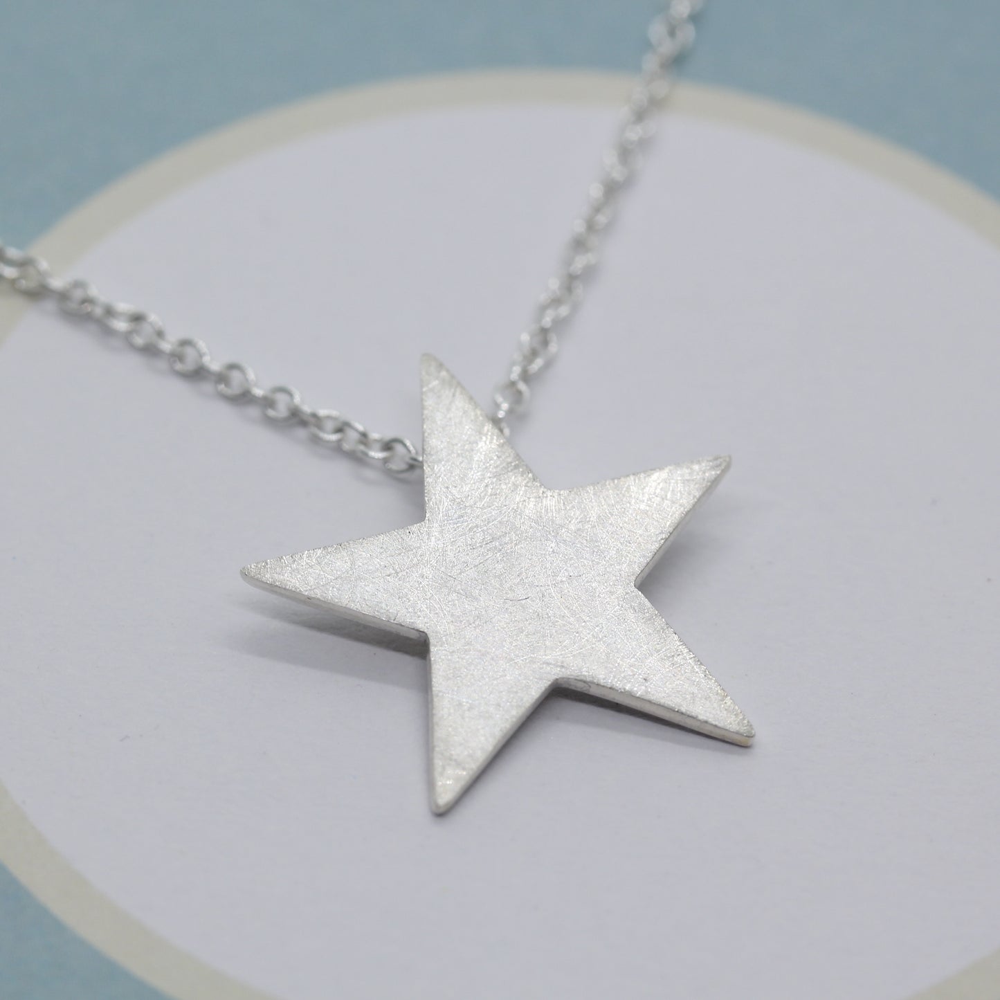 Silberstern mit Kette